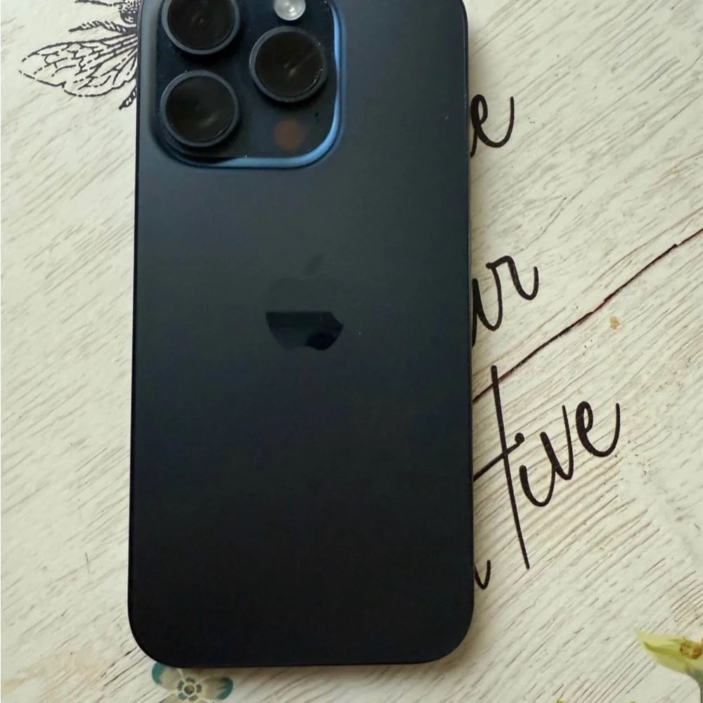 Apple Smartphone with Black Frame and Colorful Display +airpods generation 4 Pro